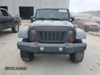2011 Jeep Wrangler Rubicon with VIN 1J4BA6D15BL585388, listed as a Copart auction lot 76272184 with 119,043 mi miles and Clean title. Bid and sale history available at DreamBid. Image 5.