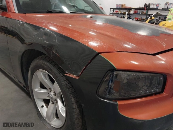 2006 Dodge Charger R/T with VIN 2B3KA53H56H195653, listed as a IAAI auction lot 39254908 with 164,629 mi miles. Bid and sale history available at carsss.com. Image 12.