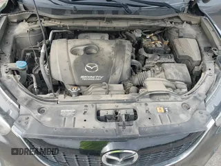 2014 Mazda CX-5 Touring z VIN JM3KE4CY2E0348500, wystawiony jako IAAI lot #42318155 z przebiegiem 182 616 mil mil oraz . Historia ofert i sprzedaży dostępna na DreamBid. Obrazek 10.