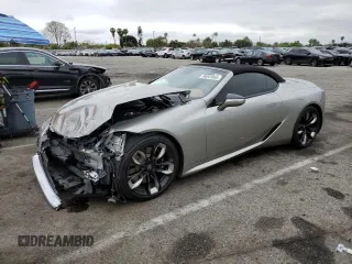 2024 Lexus LC 500h with VIN JTHMPAAY2RA107886, listed as a Copart auction lot 56041065 with 14,203 mi miles and Salvage title. Bid and sale history available at DreamBid. Image 1.