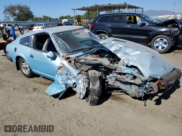 1979 Datsun 280ZX z VIN HS130123182, wystawiony jako Copart lot #61076424 z przebiegiem 48 711 mil mil oraz Szkody całkowita. Historia ofert i sprzedaży dostępna na DreamBid. Obrazek 4.
