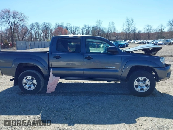 2015 Toyota Tacoma with VIN 3TMLU4EN0FM194841, listed as a IAAI auction lot 41860349 with 200,005 mi miles and . Bid and sale history available at DreamBid. Image 14.