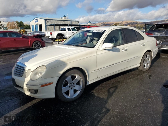2007 Mercedes-Benz E 550 with VIN WDBUF90X77X212587, listed as a Copart auction lot 79753664 with 111,768 mi miles and Salvage Title. Bid and sale history available at carsss.com. Image 1.