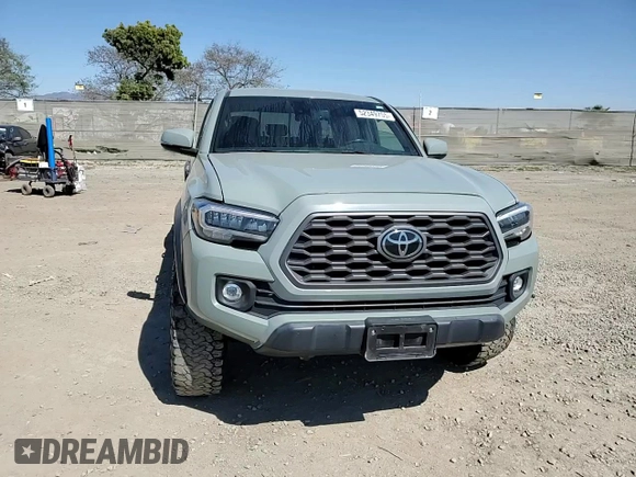 2022 Toyota Tacoma SR z VIN 3TMCZ5AN5NM506941, wystawiony jako Copart lot #52349755 z przebiegiem 46 013 mil mil oraz Szkoda całkowita • Salvage title. Historia ofert i sprzedaży dostępna na DreamBid. Obrazek 11.
