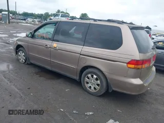 2003 Honda Odyssey EX-L with VIN 5FNRL180X3B151488, listed as a IAAI auction lot 42681426 with 231,065 mi miles and . Bid and sale history available at DreamBid. Image 3.