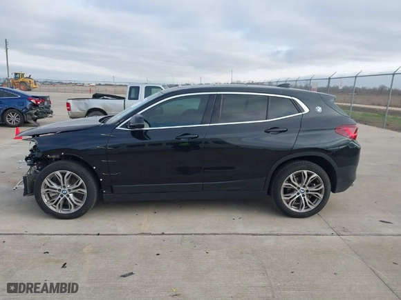 2022 BMW X2 sDrive28i with VIN WBXYH9C09N5U63246, listed as a IAAI auction lot 41573667 with NaN miles. Bid and sale history available at carsss.com. Image 14.