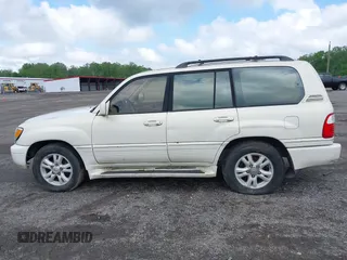 2001 Lexus LX 470 z VIN JTJHT00W613506010, wystawiony jako IAAI lot #42277268 z przebiegiem 186 671 mil mil oraz . Historia ofert i sprzedaży dostępna na DreamBid. Obrazek 14.