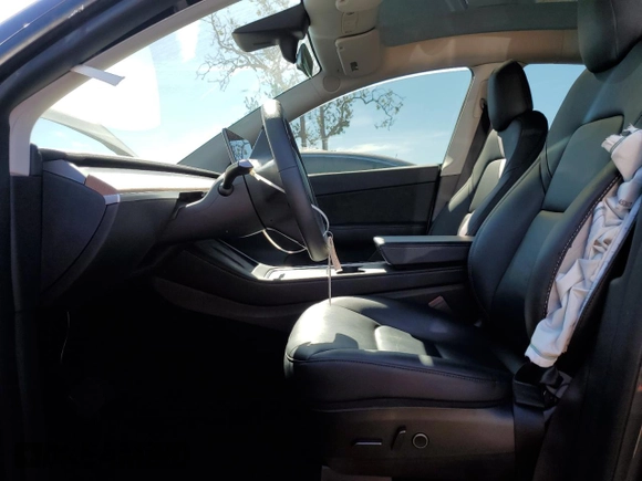 2022 Tesla Model Y Long Range with VIN 7SAYGDEE2NF402320, listed as a Copart auction lot 50396605 with 27,426 mi miles and Salvage Title. Bid and sale history available at DreamBid. Image 7.
