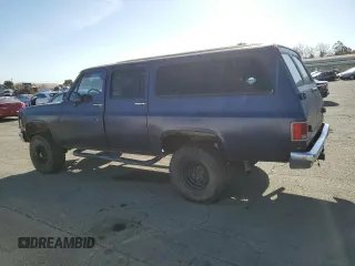 1991 GMC Suburban z VIN 1GKEV16K9MF510909, wystawiony jako Copart lot #81326004 z przebiegiem 216 778 mil mil oraz Tytuł czysty. Historia ofert i sprzedaży dostępna na DreamBid. Obrazek 2.