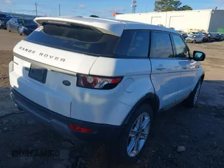 2013 Land Rover Range Rover Evoque Pure z VIN SALVN2BG2DH739464, wystawiony jako IAAI lot #41661683 z przebiegiem 103 227 mil mil oraz . Historia ofert i sprzedaży dostępna na DreamBid. Obrazek 4.