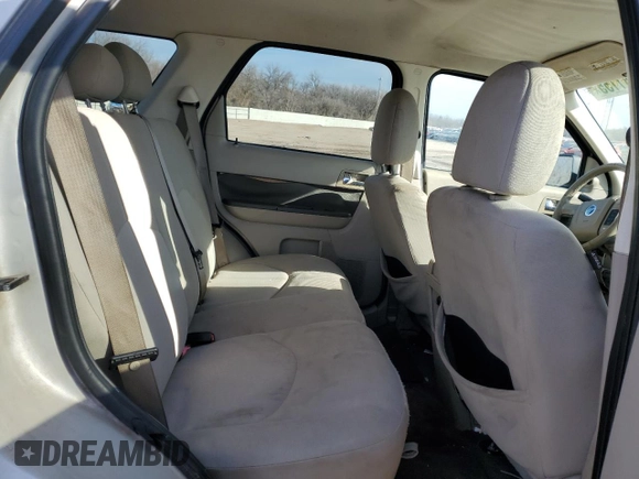 2009 Mercury Mariner with VIN 4M2CU81G69KJ06248, listed as a Copart auction lot 46681155 with 208,073 mi miles and Salvage title. Bid and sale history available at DreamBid. Image 11.