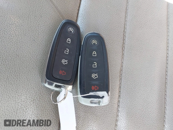 2016 Ford Escape Titanium with VIN 1FMCU9J90GUB35593, listed as a IAAI auction lot 42309020 with 173,019 mi miles and . Bid and sale history available at DreamBid. Image 11.