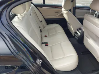2015 BMW 5 Series 535i with VIN WBA5B1C58FG127959, listed as a IAAI auction lot 41571017 with 122,274 mi miles and . Bid and sale history available at carsss.com. Image 8.