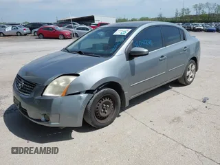 2009 Nissan Sentra S FE+ z VIN 3N1AB61E99L671293, wystawiony jako IAAI lot #42042248 z przebiegiem 126 899 mil mil oraz . Historia ofert i sprzedaży dostępna na DreamBid. Obrazek 2.