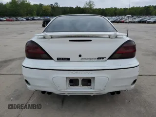 2000 Pontiac Grand Am GT with VIN 1G2NW52E2YM799735, listed as a Copart auction lot 51782455 with 181,850 mi miles and Salvage title. Bid and sale history available at DreamBid. Image 6.
