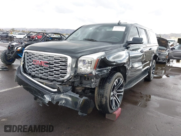 2019 GMC Yukon XL SLT with VIN 1GKS1GKC7KR155668, listed as a IAAI auction lot 41751792 with 163,537 mi miles. Bid and sale history available at carsss.com. Image 2.