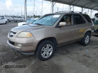 2004 Acura MDX Touring Pkg RES w/Nav with VIN 2HNYD18944H529592, listed as a IAAI auction lot 41922111 with 273,869 mi miles. Bid and sale history available at carsss.com. Image 2.