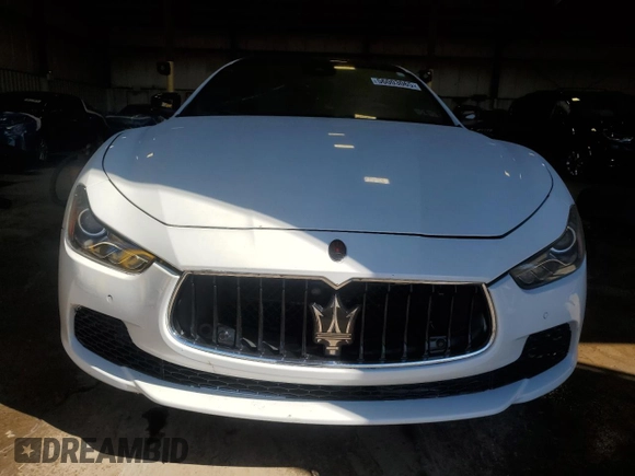 2017 Maserati Ghibli S Q4 z VIN ZAM57RTAXH1221570, wystawiony jako Copart lot #56003065 z przebiegiem 96 414 mil mil oraz Szkody całkowita. Historia ofert i sprzedaży dostępna na DreamBid. Obrazek 5.