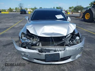 2009 Lexus IS 250 with VIN JTHCK262192030877, listed as a IAAI auction lot 42209789 with 147,376 mi miles and . Bid and sale history available at DreamBid. Image 12.
