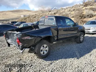 2005 Toyota Tacoma with VIN 5TEUU42N65Z037986, listed as a Copart auction lot 48816565 with 154,286 mi miles and Salvage Title. Bid and sale history available at DreamBid. Image 3.