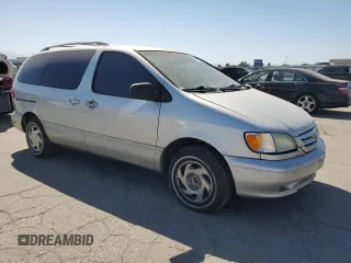 2002 Toyota Sienna LE with VIN 4T3ZF13CX2U458385, listed as a Copart auction lot 69523254 with 187,836 mi miles and Salvage Title. Bid and sale history available at carsss.com. Image 4.