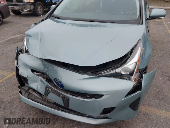 2017 Toyota Prius Two with VIN JTDKARFU7H3052594, listed as a IAAI auction lot 42035969 with 50,789 mi miles and . Bid and sale history available at DreamBid. Image 6.