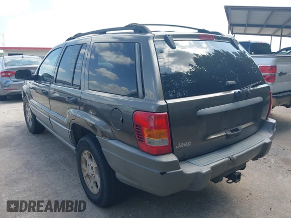 1999 Jeep Grand Cherokee Laredo with VIN 1J4GW58S2XC524365, listed as a IAAI auction lot 42432625 with 284,942 mi miles and . Bid and sale history available at DreamBid. Image 3.