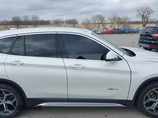 2016 BMW X1 xDrive28i with VIN WBXHT3C35GP886144, listed as a IAAI auction lot 41954742 with 89,268 mi miles. Bid and sale history available at carsss.com. Image 14.