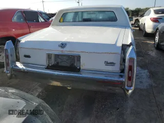 1990 Cadillac Brougham z VIN 1G6DW54Y6LR711203, wystawiony jako Copart lot #76484634 z przebiegiem 121 310 mil mil oraz Nie do naprawy. Historia ofert i sprzedaży dostępna na DreamBid. Obrazek 6.