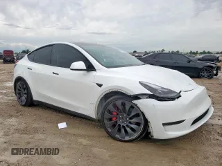 2024 Tesla Model Y Performance z VIN 7SAYGDEF0RA266605, wystawiony jako Copart lot #57820905 z przebiegiem Nie podano mil oraz Szkoda całkowita • Salvage title. Historia ofert i sprzedaży dostępna na DreamBid. Obrazek 4.