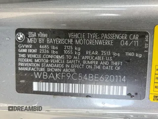 2011 BMW 3 Series 335i xDrive with VIN WBAKF9C54BE620114, listed as a Copart auction lot 56594205 with 85,473 mi miles and Salvage title. Bid and sale history available at DreamBid. Image 12.