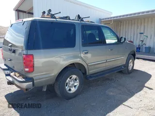 1999 Ford Expedition XLT z VIN 1FMPU18L3XLB91778, wystawiony jako IAAI lot #42266991 z przebiegiem Nie podano mil oraz . Historia ofert i sprzedaży dostępna na DreamBid. Obrazek 4.
