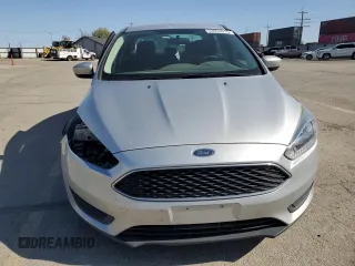2018 Ford Focus SE z VIN 1FADP3F29JL206110, wystawiony jako Copart lot #53953515 z przebiegiem 80 841 mil mil oraz Szkoda całkowita • Salvage title. Historia ofert i sprzedaży dostępna na DreamBid. Obrazek 5.