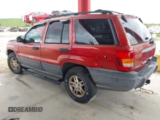 2003 Jeep Grand Cherokee Laredo z VIN 1J4GX48SX3C604630, wystawiony jako IAAI lot #42762013 z przebiegiem 202 563 mil mil oraz . Historia ofert i sprzedaży dostępna na DreamBid. Obrazek 3.