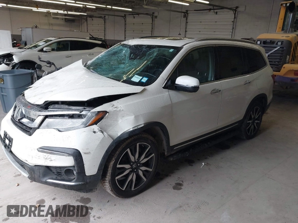 2019 Honda Pilot Elite with VIN 5FNYF6H08KB054725, listed as a IAAI auction lot 40496860 with 91,284 mi miles and . Bid and sale history available at DreamBid. Image 2.