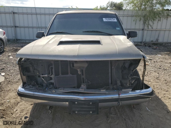 1999 Chevrolet Tahoe with VIN 1GNEC13R6XJ494812, listed as a Copart auction lot 76398254 with 299,584 mi miles and Salvage Title. Bid and sale history available at carsss.com. Image 5.