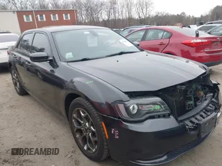 2015 Chrysler 300 with VIN 2C3CCAGG5FH814392, listed as a IAAI auction lot 41239339 with 142,046 mi miles. Bid and sale history available at carsss.com. Image 1.