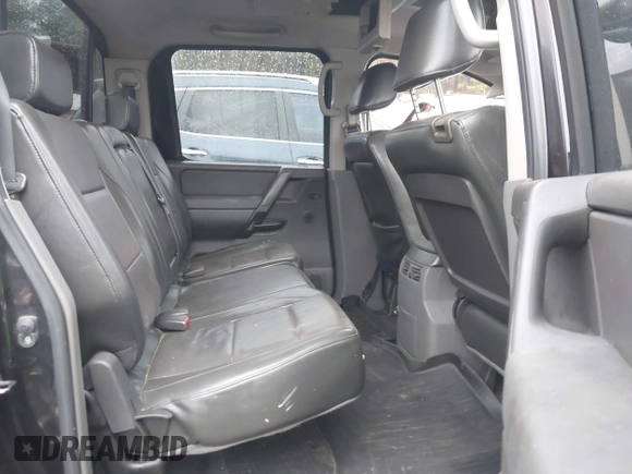 2007 Nissan Titan SE with VIN 1N6BA07A17N212890, listed as a IAAI auction lot 41034412 with 211,881 mi miles and . Bid and sale history available at DreamBid. Image 8.