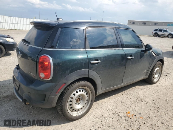 2012 MINI Countryman S with VIN WMWZC5C54CWL57554, listed as a Copart auction lot 59699865 with 144,737 mi miles and Salvage title. Bid and sale history available at DreamBid. Image 3.