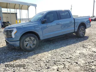 2023 Ford F-150 Lightning Pro z VIN 1FT6W1EV1PWG53186, wystawiony jako Copart lot #52423485 z przebiegiem 23 518 mil mil oraz Szkoda całkowita • Salvage title. Historia ofert i sprzedaży dostępna na DreamBid. Obrazek 1.