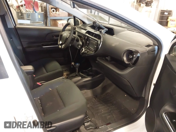 2018 Toyota Prius One with VIN JTDKDTB35J1599642, listed as a IAAI auction lot 42031112 with 58,801 mi miles and . Bid and sale history available at DreamBid. Image 5.