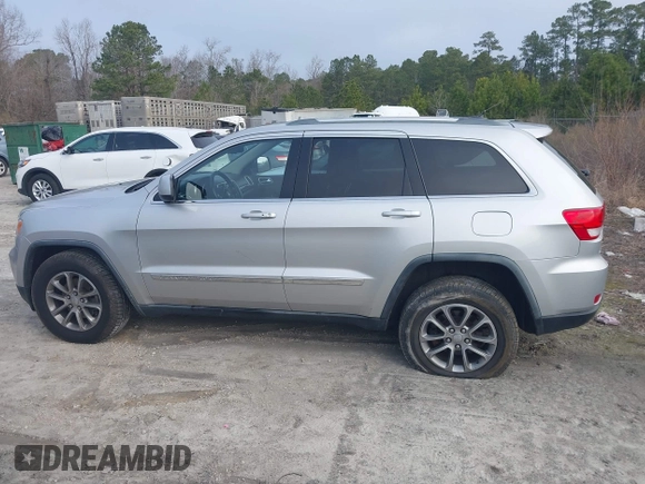 2012 Jeep Grand Cherokee Laredo with VIN 1C4RJFAG7CC189381, listed as a IAAI auction lot 41429085 with 137,238 mi miles. Bid and sale history available at carsss.com. Image 13.