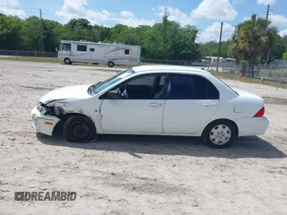 2002 Mitsubishi Lancer ES with VIN JA3AJ26E42U054430, listed as a IAAI auction lot 41918246 with 192,996 mi miles. Bid and sale history available at carsss.com. Image 14.