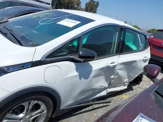 2020 Chevrolet Bolt EV LT with VIN 1G1FY6S03L4132176, listed as a IAAI auction lot 42211304 with 62,063 mi miles and . Bid and sale history available at DreamBid. Image 15.