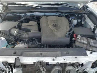 2023 Toyota Tacoma SR z VIN 3TMCZ5AN7PM594216, wystawiony jako Copart lot #55870755 z przebiegiem 60 548 mil mil oraz Szkoda całkowita • Salvage title. Historia ofert i sprzedaży dostępna na DreamBid. Obrazek 11.