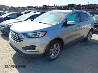 2020 Ford Edge SEL with VIN 2FMPK3J92LBA74106, listed as a IAAI auction lot 42157636 with 92,305 mi miles and . Bid and sale history available at DreamBid. Image 2.
