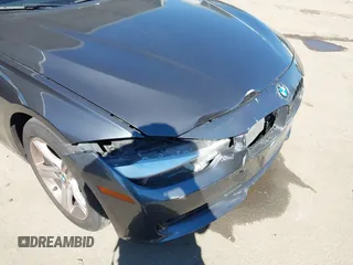 2015 BMW 3 Series 328i with VIN WBA3C1C51FK123852, listed as a IAAI auction lot 41857179 with 90,308 mi miles and . Bid and sale history available at carsss.com. Image 6.