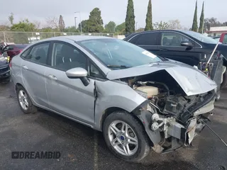 2017 Ford Fiesta SE with VIN 3FADP4BJXHM116900, listed as a IAAI auction lot 41815656 with 74,662 mi miles and . Bid and sale history available at DreamBid. Image 14.