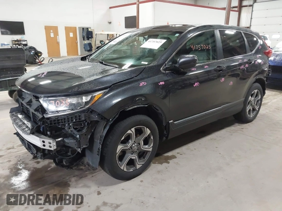 2017 Honda CR-V EX with VIN 5J6RW2H57HL059990, listed as a IAAI auction lot 41757025 with 136,533 mi miles. Bid and sale history available at carsss.com. Image 2.