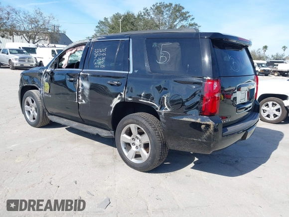 2018 Chevrolet Tahoe LT with VIN 1GNSCBKCXJR132867, listed as a IAAI auction lot 41456319 with 59,131 mi miles and . Bid and sale history available at DreamBid. Image 3.
